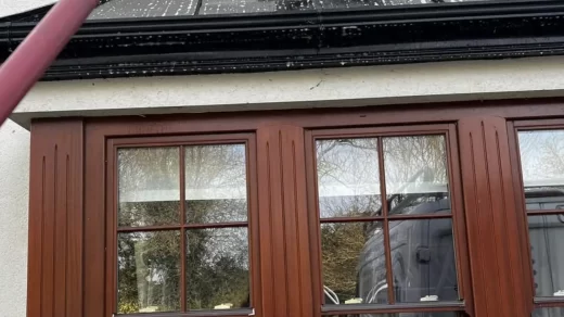 How do people clean high windows?