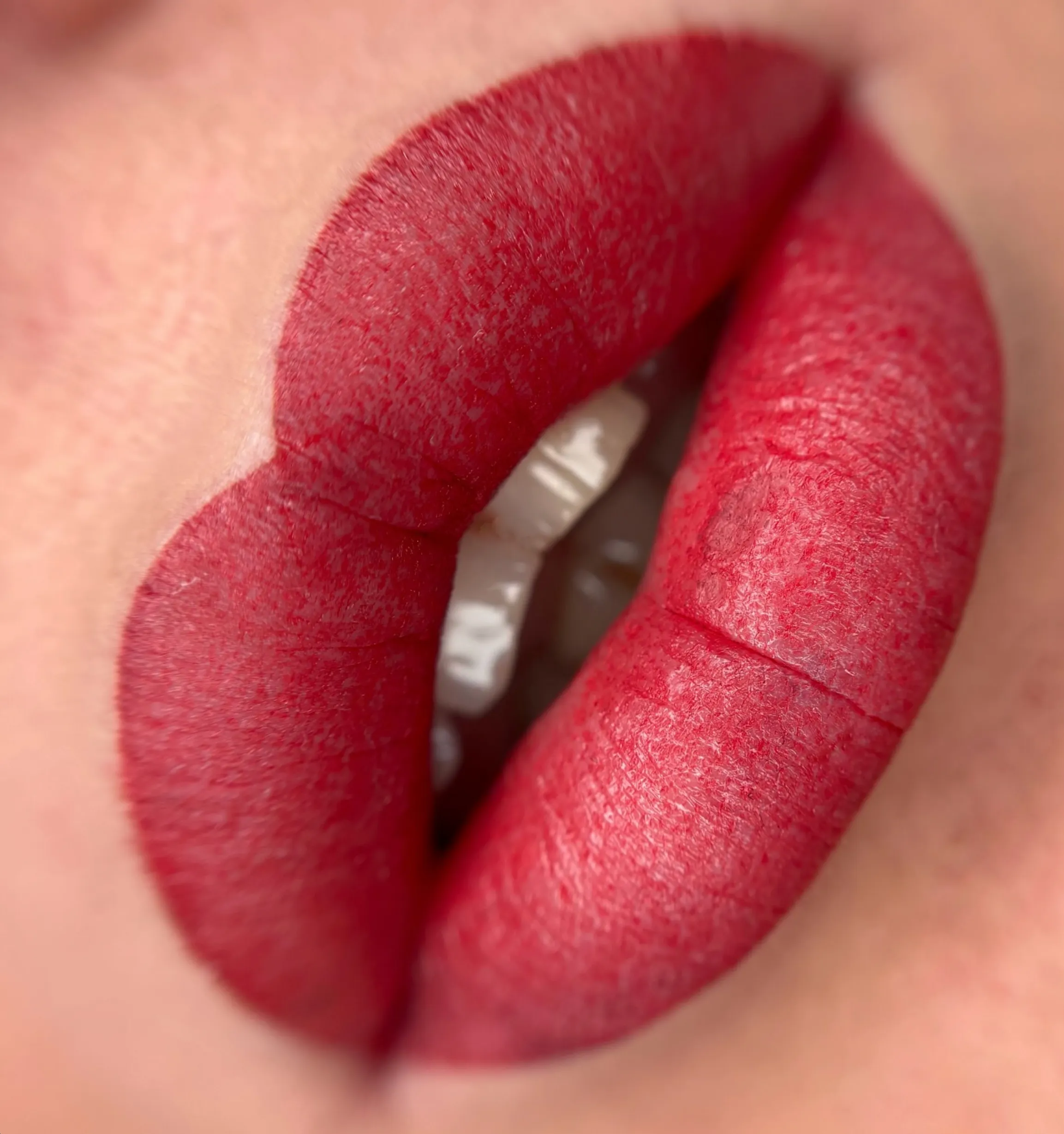 mature skin lip tattoo