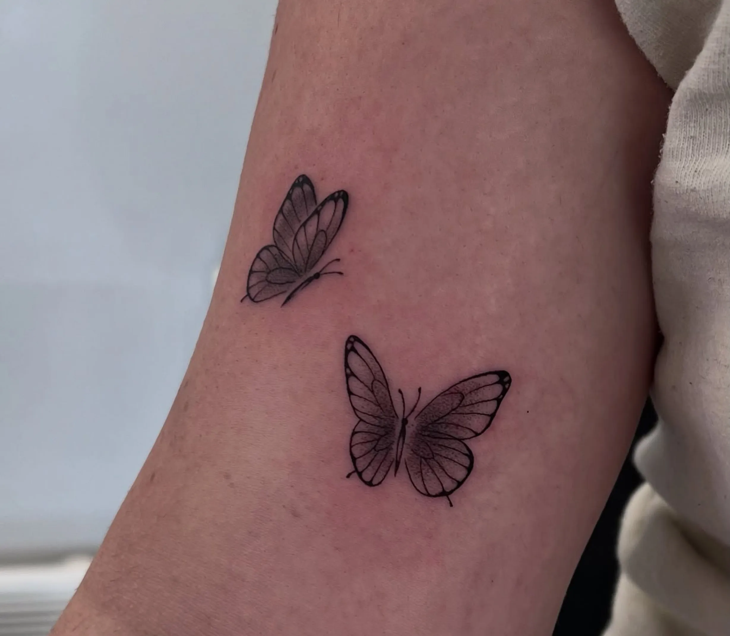 shaded fine line tattoo